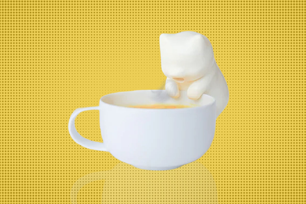 Ένα γατάκι φροντίζει να πίνεις τον καφέ σου στην ιδανική θερμοκρασία